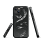 Phone case with detailed black python design on dark background.