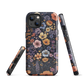 Phone case with colourful wildflowers on dark background, floral art design