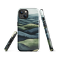 Phone case with layered mountain and forest landscape in blue and green hues