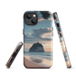 Phone case with Cathedral Cove beach and sunset scene, featuring soft skies and sea stack