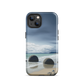 Moeraki Boulders coastal designer phone case with ocean waves and dramatic NZ sky