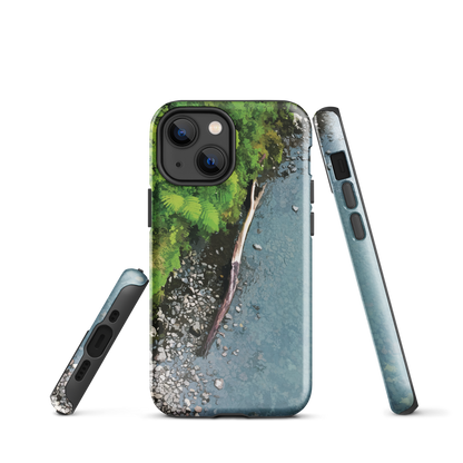 Resting Place phone case with aerial artwork of river rocks, green bush, and driftwood in a New Zealand stream.