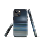 Dark abstract phone case with blue and grey streaks and glossy finish.