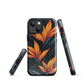 Phone case with bold orange bird of paradise flowers on dark background.