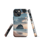 Phone case with Cathedral Cove beach and sunset scene, featuring soft skies and sea stack