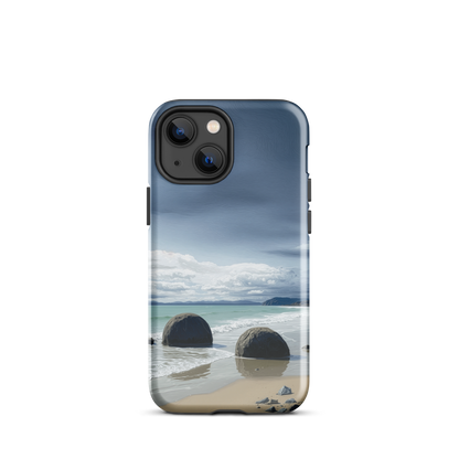 Moeraki Boulders coastal designer phone case with ocean waves and dramatic NZ sky
