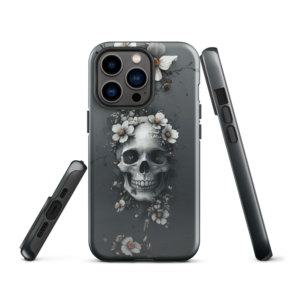 Gothic phone case with a floral skull design in grey tones, featuring white blossoms and dark detailing.