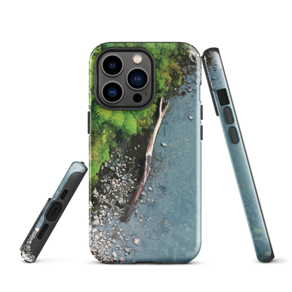 Resting Place phone case with aerial artwork of river rocks, green bush, and driftwood in a New Zealand stream.