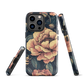 Phone case with vintage-style pink roses and bees on dark background, floral New Zealand artwork.