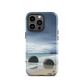 Moeraki Boulders coastal designer phone case with ocean waves and dramatic NZ sky