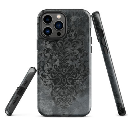 Dark damask patterned phone case with a vintage gothic aesthetic and textured stone background.