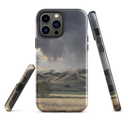 Designer phone case with NZ landscape painting of Te Hauke and cloudy skies by Ben Hart.