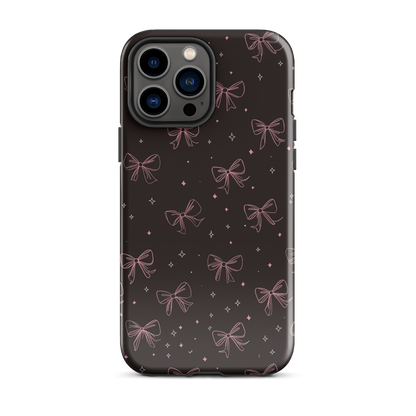 Midnight Bow seamless repeat pattern — pink hand-drawn ribbon bows and sparkle stars on a black background