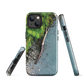 Resting Place phone case with aerial artwork of river rocks, green bush, and driftwood in a New Zealand stream.