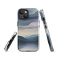 Phone case with moody blue and purple layered mountain and lake landscape artwork