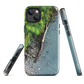 Resting Place phone case with aerial artwork of river rocks, green bush, and driftwood in a New Zealand stream.