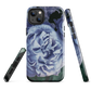 Designer phone case with a bold blue rose artwork and glossy finish.