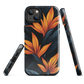 Phone case with bold orange bird of paradise flowers on dark background.