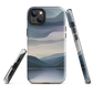 Phone case with moody blue and purple layered mountain and lake landscape artwork
