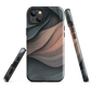 Phone case with flowing abstract design in black, copper and charcoal tones, inspired by dusk shadows