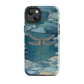 Nature-inspired phone case featuring a dragonfly over calm water with blue and green forest tones.