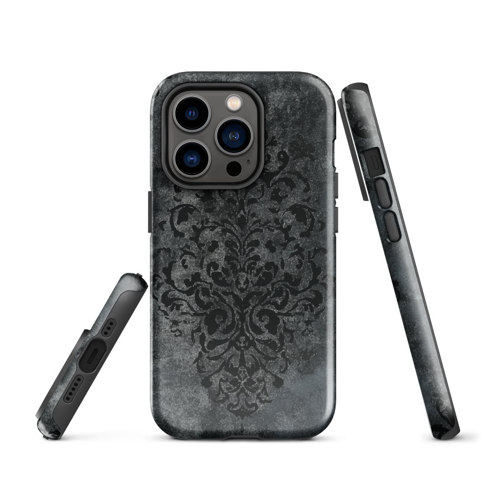 Dark damask patterned phone case with a vintage gothic aesthetic and textured stone background.