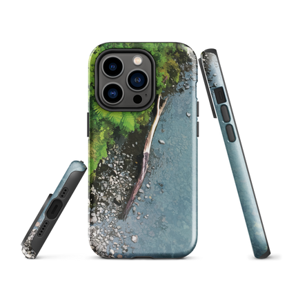 Resting Place phone case with aerial artwork of river rocks, green bush, and driftwood in a New Zealand stream.