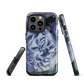 Designer phone case with a bold blue rose artwork and glossy finish.