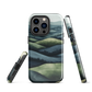 Phone case with layered mountain and forest landscape in blue and green hues