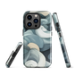 Phone case with abstract swirling ocean waves in blue and cream