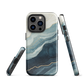An elegant abstract phone case inspired by layered coastal forms in blue and teal tones.