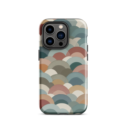 A soft retro-inspired phone case featuring layered arc shapes in warm, earthy tones.