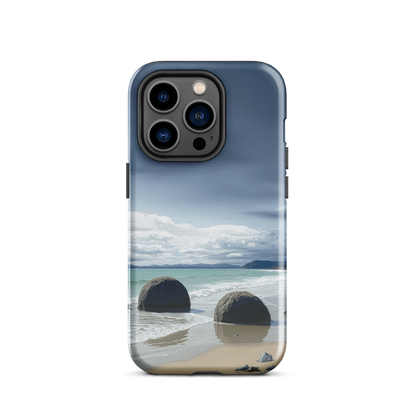 Moeraki Boulders coastal designer phone case with ocean waves and dramatic NZ sky