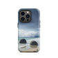 Moeraki Boulders coastal designer phone case with ocean waves and dramatic NZ sky