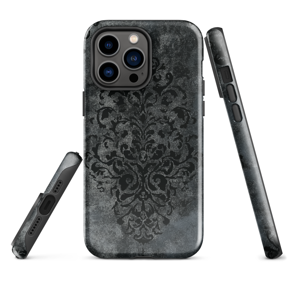 Dark damask patterned phone case with a vintage gothic aesthetic and textured stone background.