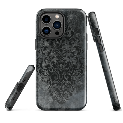 Dark damask patterned phone case with a vintage gothic aesthetic and textured stone background.