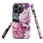 Designer phone case with pink and purple hydrangea floral artwork.