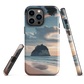 Phone case with Cathedral Cove beach and sunset scene, featuring soft skies and sea stack