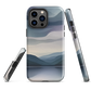 Phone case with moody blue and purple layered mountain and lake landscape artwork