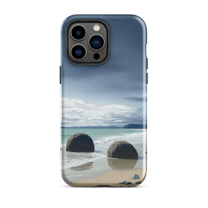Moeraki Boulders coastal designer phone case with ocean waves and dramatic NZ sky