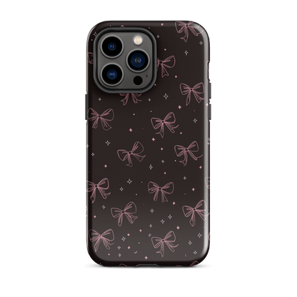 Midnight Bow seamless repeat pattern — pink hand-drawn ribbon bows and sparkle stars on a black background