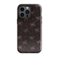 Midnight Bow seamless repeat pattern — pink hand-drawn ribbon bows and sparkle stars on a black background