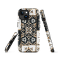 Moroccan tile pattern phone case in black, white, and gold tones with vintage-inspired design.
