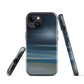 Dark abstract phone case with blue and grey streaks and glossy finish.