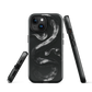 Phone case with detailed black python design on dark background.