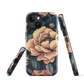 Phone case with vintage-style pink roses and bees on dark background, floral New Zealand artwork.