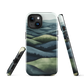 Phone case with layered mountain and forest landscape in blue and green hues