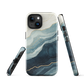 An elegant abstract phone case inspired by layered coastal forms in blue and teal tones.