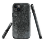 Dark damask patterned phone case with a vintage gothic aesthetic and textured stone background.