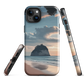 Phone case with Cathedral Cove beach and sunset scene, featuring soft skies and sea stack